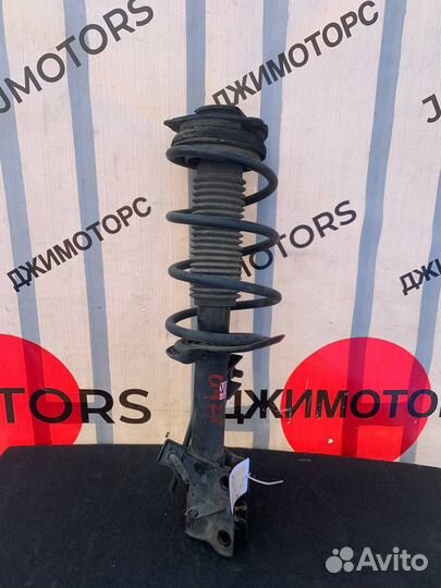 Амортизатор передний левый Nissan X Trail T31