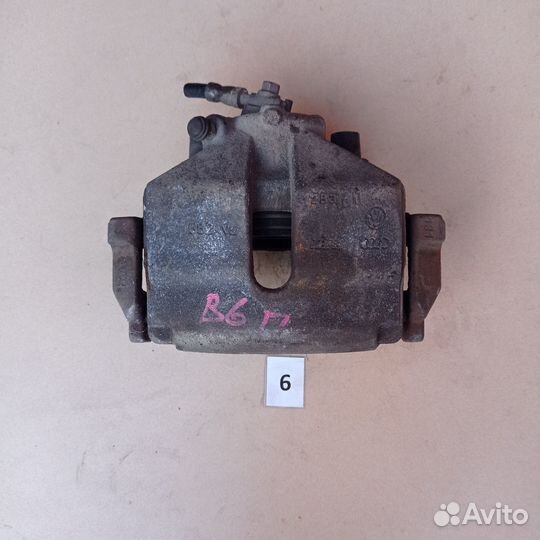 Суппорт тормозной передний правый VW Passat B6