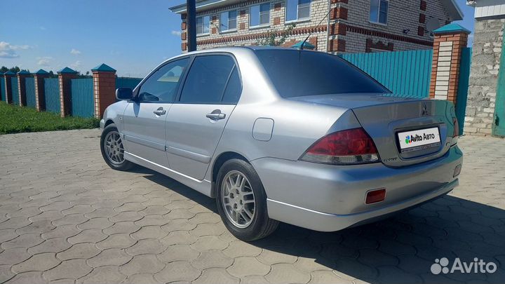 Mitsubishi Lancer 1.6 МТ, 2006, 125 000 км