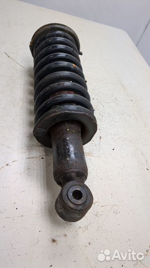 Амортизатор подвески левый передний Nissan Pathfinder