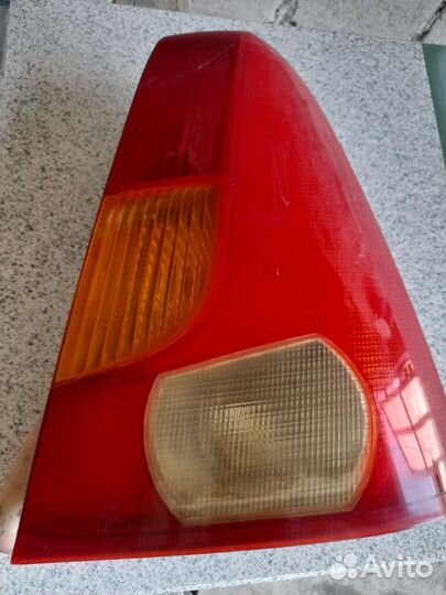 Фонарь задний рено логан стоп сигнал