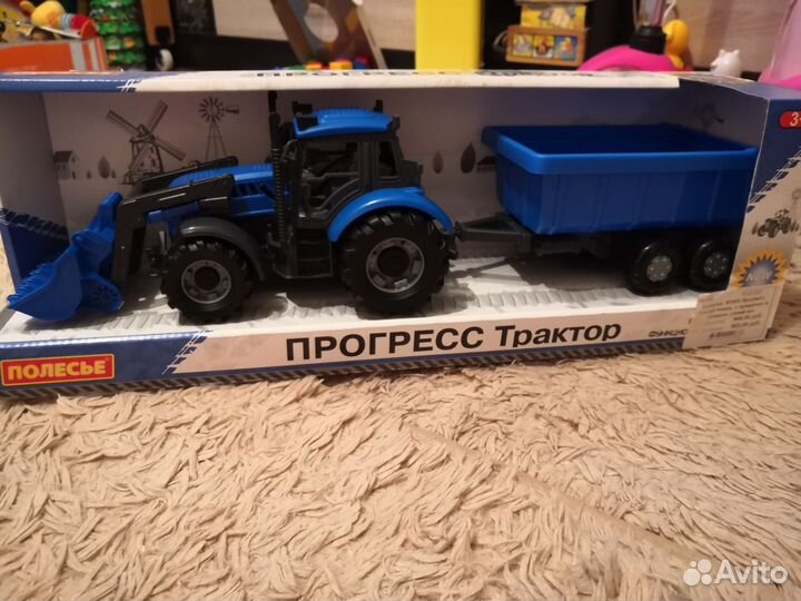 Новый в упаковке.Игрушка синий трактор инерционный