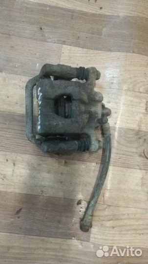 Суппорт задний Nissan Ниссан Tiida Тиида хетчбек