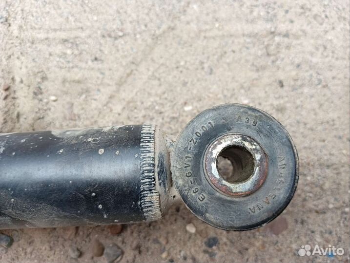 Задний амортизатор Lancer X