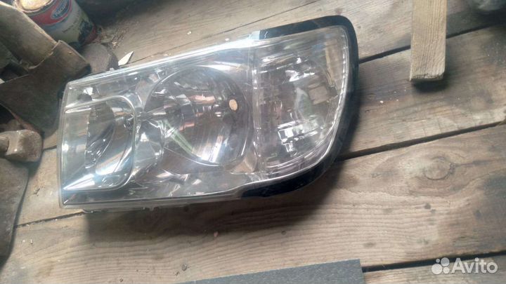 Toyota land cruiser 100 стекло фары