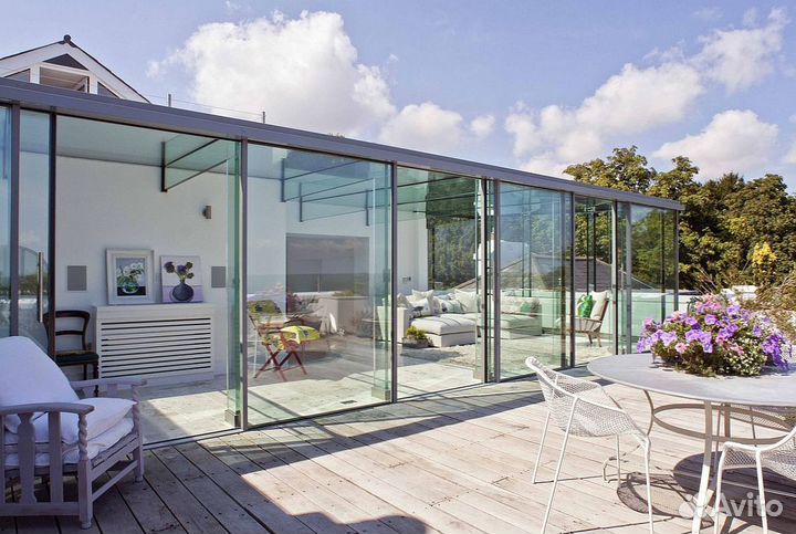 Безрамное раздвижное остекление