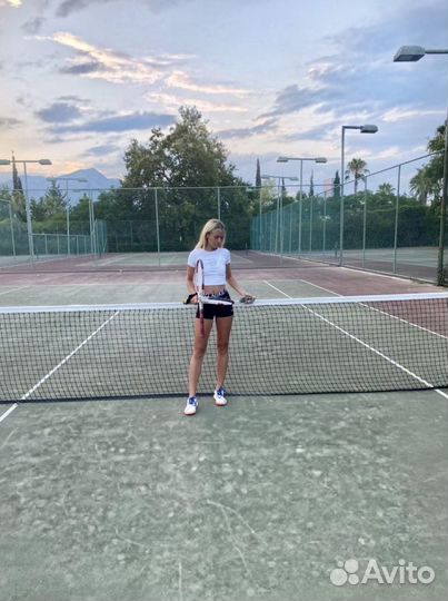 Тренер по большому теннису