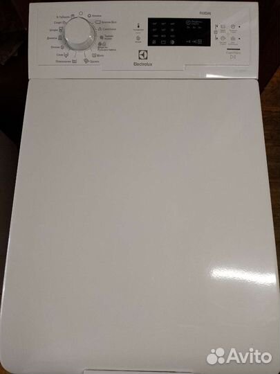 Стиральная машина с вертикальной загрузкой