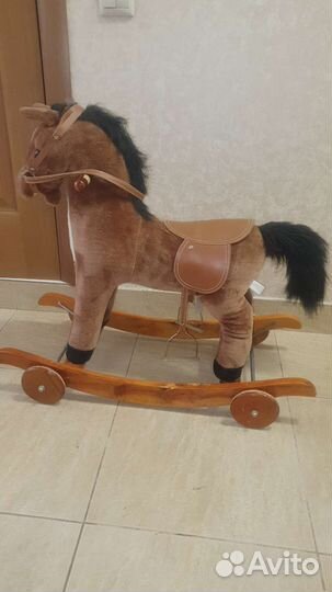 Детская качалка лошадь на колесиках