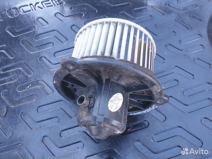 Моторчик отопителя печки Kia Sportage I Спортедж 1