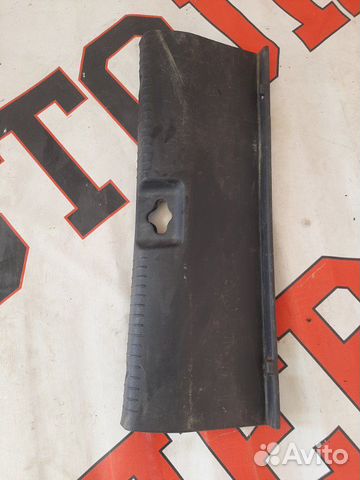 Обшивка багажника задней стенки Hyundai Solaris