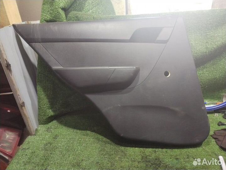Обшивка боковой двери задняя левая Chevrolet Aveo