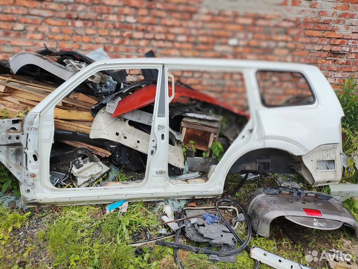 Боковина на Паджеро 4 левая крыло заднее левое