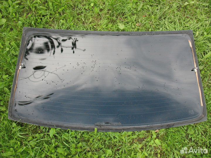 Заднее стекло Renault Logan