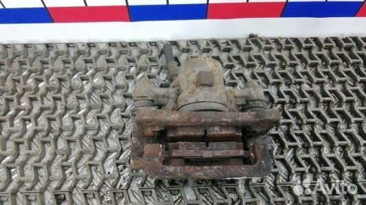 Суппорт тормозной задний правый toyota corolla E12