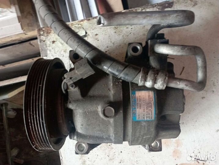 Компрессор кондиционера nissan