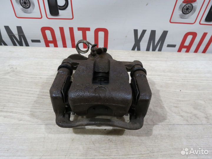 Суппорт тормозной задний левый Hyundai Solaris