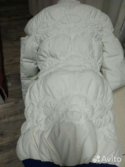 Пуховики длинные