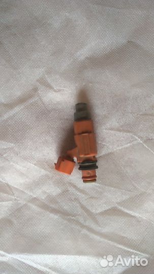 Форсунка топливная на mitsubishi lancer 9