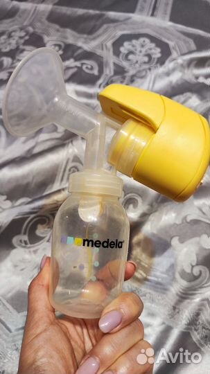 Молокоотсос medela электрический