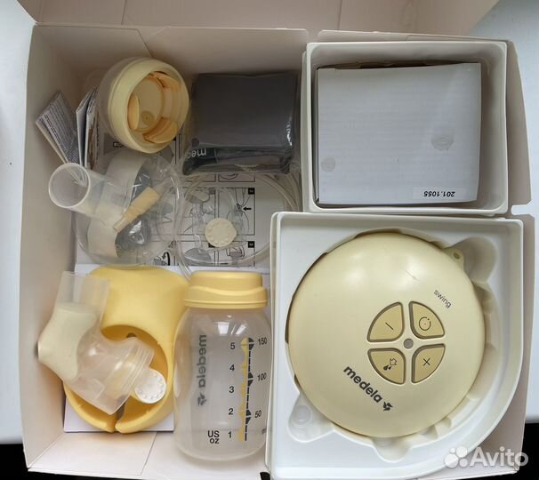 Молокоотсос medela электрический