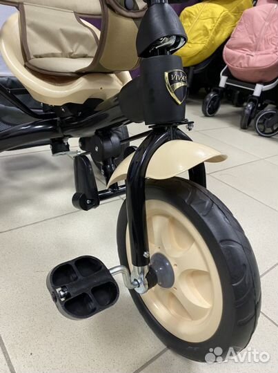 Трехколесный велосипед с ручкой