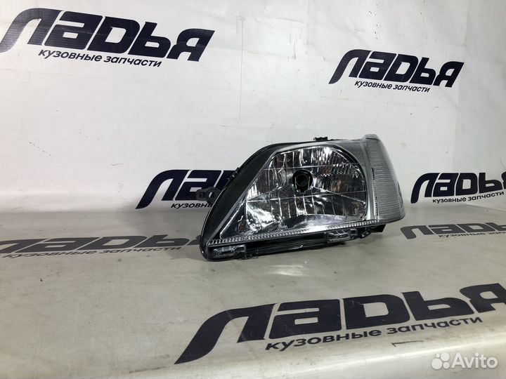 Фара Renault Logan (2004-2009) фаза 1 левая (повторитель у крыла)