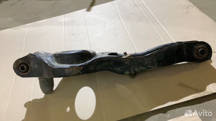 Задний поперечный под пружину рычаг Мазда 3 вк