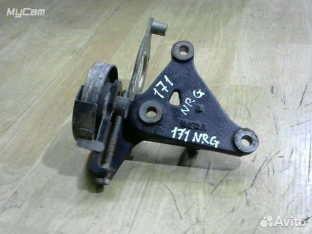 Натяжитель ремня генератора Nissan Primera 11