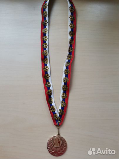 Спортивная медаль за победу в соревнованиях