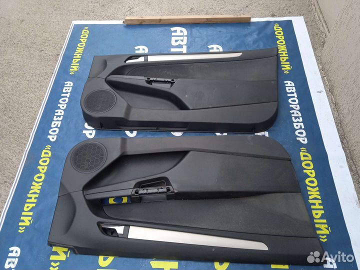 Обшивка передней двери Opel Astra GTC