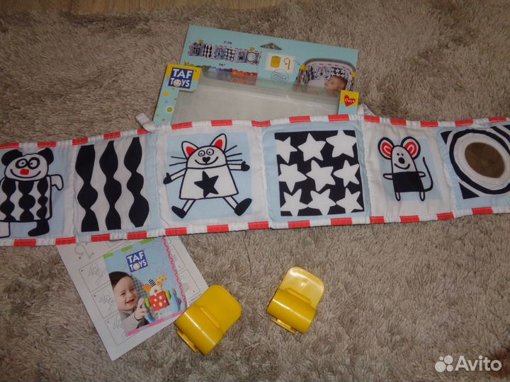Развивающая книжка-игрушка с клипсами Taf Toys
