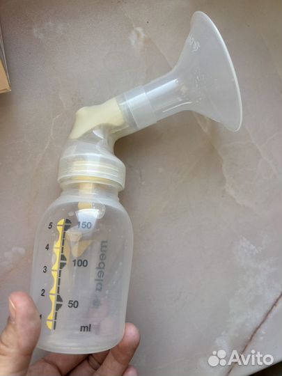 Молокоотсос medela