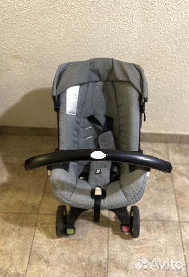 Детское автокресло коляска doona