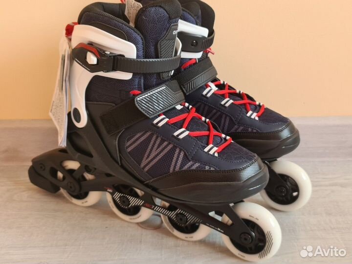 Роликовые коньки