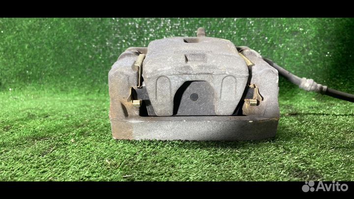 Суппорт тормозной задний правый Mazda CX-9 1