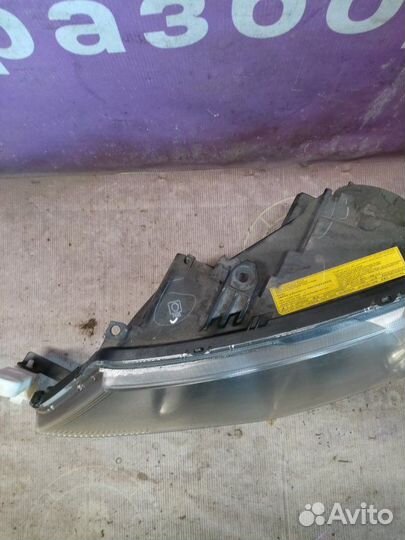 Фара ксеноновая передняя левая Mitsubishi