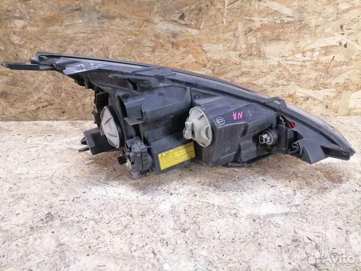 Фара левая ксенон Mitsubishi Grandis NA4W