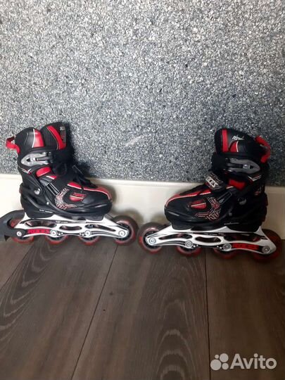 Роликовые коньки