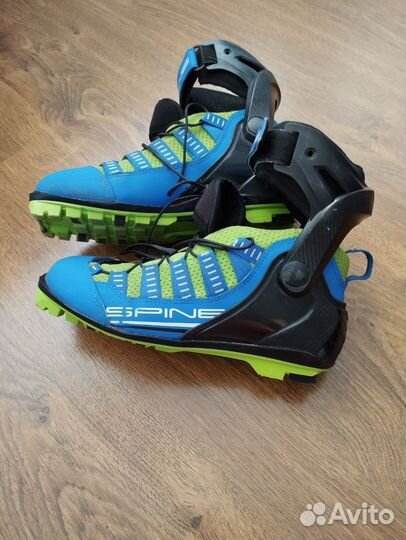 Лыжные ботинки коньковые spine