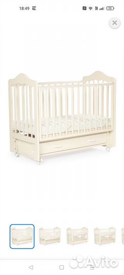 Детская кроватка с маятником