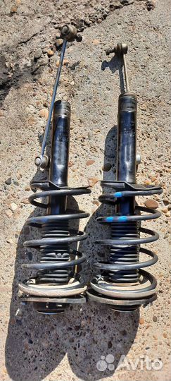Стойки амортизатора передние Peugeot 206