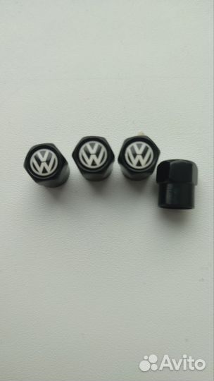 Брелоки и колпачки с логотипом VW и Chevrolet