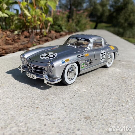 Модель авто Mercedes-Benz 300SL серебристый