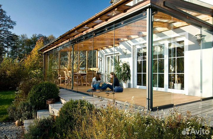 Безрамное раздвижное остекление