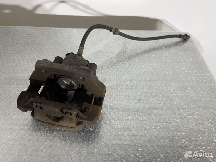 Суппорт тормозной задний правый Bmw X5 E70 N55B30