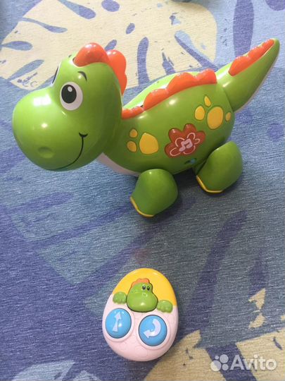 Музыкальный на пульте динозаврик