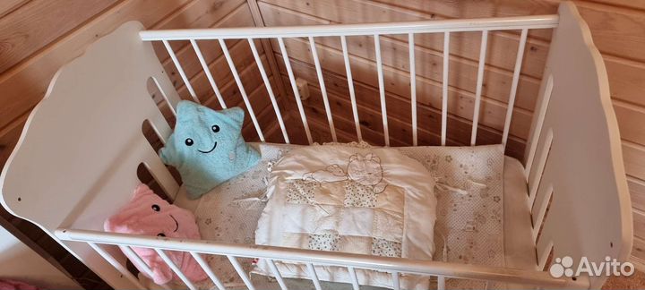Детская кроватка с поперечным маятником