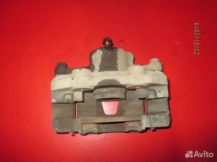 Суппорт тормозной 96234340 Chevrolet Lanos