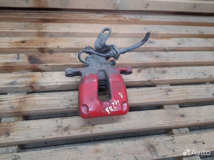 Суппорт тормозной задний левый Volkswagen Golf 5